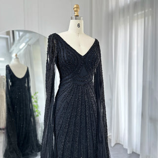 Exquisite 2024 Arabic Mermaid Evening Gowns in Luxurious Black: Featuring Cape Sleeves and Beaded Details for Women's Wedding and Party Attire in Dubai