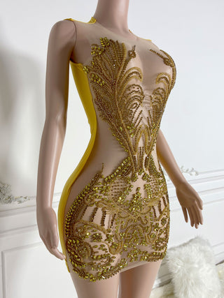 Sheer Illusion Mini Dress with Intricate Beadwork and High Neckline