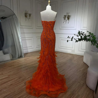 Ships in 1 to 3 Days - Sunkissed Glamour: Orange Spaghetti Strap Mermaid Evening Gown - Luxury Feather and Bead Detail for Women's Wedding Party