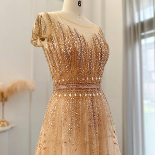 Golden Blush Elegance: Beaded Pale Pink Plus Size Evening Gown with Arabic-inspired Glamour for Weddings and Formal Occasions.