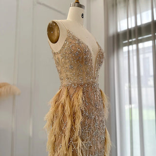 Champagne Dreams 2024: Luxury Feathered Mermaid Evening Dress with Spaghetti Straps, Perfect for Women at Weddings and Proms.