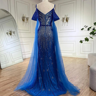 Ships in 1 to 3 Days - 2024 Spaghetti Strap Blue Mermaid Beaded Evening Gown with Cape Sleeves - Luxury Dress