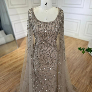 Gray Elegance: 2024 Mermaid Evening Gown with Cape Sleeves, Luxury Beading, and Arabic Inspiration