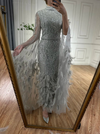 Ships in 1 to 3 Days - 2024 Silver Gray Mermaid Evening Gown with Cape Sleeves, Feathers, and Beaded Detailing - Ankle-Length Formal Dress