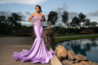 Elegant Pink Mermaid Gown with Intricate Appliques and Flowing Train