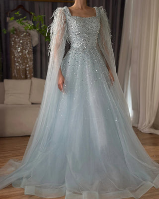 Ships in 1 to 3 Days - 2024 Arabic Blue A-Line Evening Dress - Luxury Beaded Gown with Feathers and Cape Sleeves for Formal Occasions in Saudi Arabia