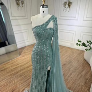 Ships in 1 to 3 Days - Turquoise Mermaid Luxury Beaded Evening Gown 2024 with One-Shoulder Cape Sleeves - Perfect for Women's Wedding Parties