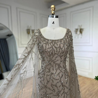 Gray Elegance: 2024 Mermaid Evening Gown with Cape Sleeves, Luxury Beading, and Arabic Inspiration