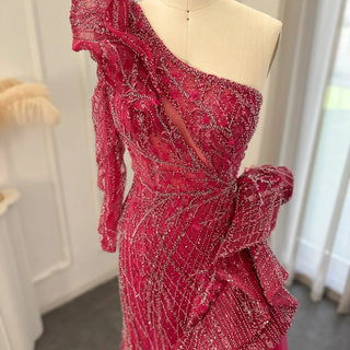 Vibrant Vision: Dubai-Inspired 2024 Fuchsia One-Shoulder Evening Gown with Side Slit - A Luxurious Mermaid Prom and Wedding Attire.