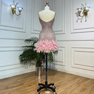 Elegance in Pink: 2024 Mermaid Mini Evening Dress with Sweetheart Neckline, Spaghetti Straps, Beading, and Feather Detail - Perfect for Women's Parties