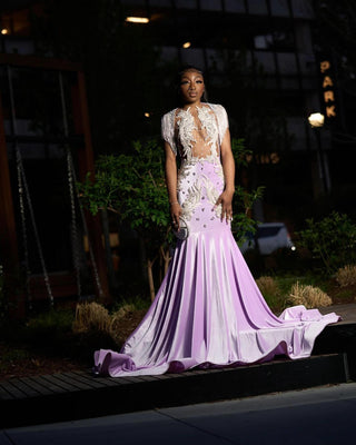 Exquisite Sheer Embellished Gown with Crystal Appliqué and Floor-Length Train