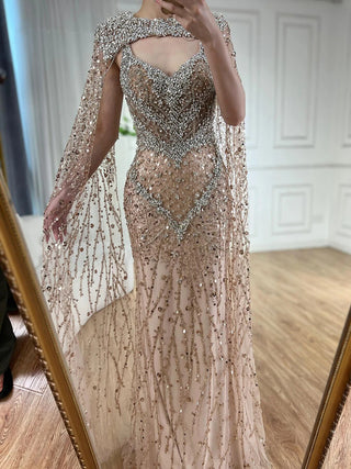 2024 Nude Mermaid Evening Gown with Beaded Crystal Detailing and Removable Cape Sleeves for Formal Occasions