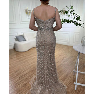 Caramel Elegant Spaghetti Strap Mermaid Evening Dress: Split Beaded Luxury with Arabic Flair 2024