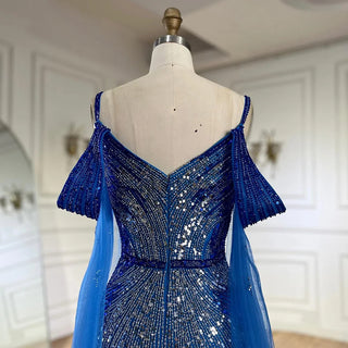 Ships in 1 to 3 Days - 2024 Spaghetti Strap Blue Mermaid Beaded Evening Gown with Cape Sleeves - Luxury Dress