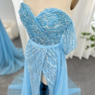 Azure Elegance: Blue Mermaid Evening Gown with High Split - Dubai-Inspired Luxury for Grand Wedding Affairs and Prom Celebrations.