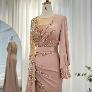 Desert Rose Brilliance: Long-Sleeved Rose Gold Mermaid Evening Gown - Dubai-Inspired Grandeur for Arabic Weddings and Formal Dinners.