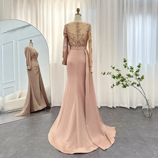 Desert Rose Brilliance: Long-Sleeved Rose Gold Mermaid Evening Gown - Dubai-Inspired Grandeur for Arabic Weddings and Formal Dinners.