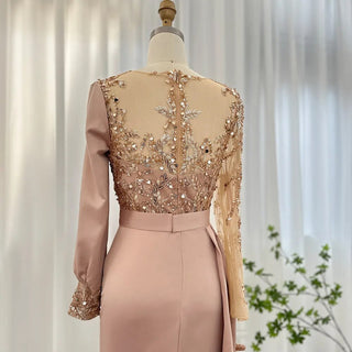 Desert Rose Brilliance: Long-Sleeved Rose Gold Mermaid Evening Gown - Dubai-Inspired Grandeur for Arabic Weddings and Formal Dinners.