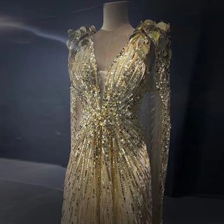 Dubai Gold Radiance: Luxury Evening Dress with Sparkly Beaded Cape, Perfect for Elegant Women at Wedding Parties and Formal Events.