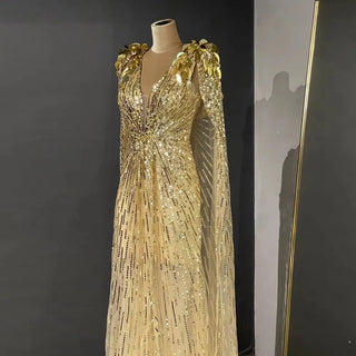 Dubai Gold Radiance: Luxury Evening Dress with Sparkly Beaded Cape, Perfect for Elegant Women at Wedding Parties and Formal Events.