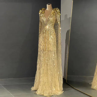 Dubai Gold Radiance: Luxury Evening Dress with Sparkly Beaded Cape, Perfect for Elegant Women at Wedding Parties and Formal Events.