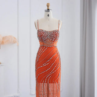 Dubai Sunset Radiance: Orange Spaghetti Straps Mermaid Evening Dress with Luxury Crystal Embellishments, Perfect for Women at Wedding Parties and Proms.