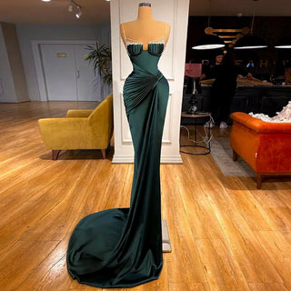 Emerald Enchantment: Spaghetti Straps Mermaid Evening Dress with Crystal Embellishments - Perfect for Women at Weddings, Proms, and Formal Parties.