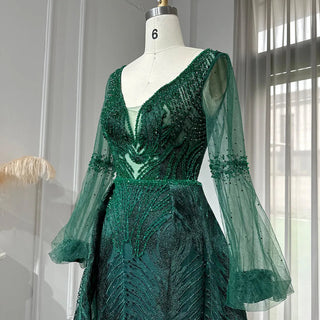 Emerald Enigma: Crystal-Adorned V-Neck Gown with Long Sleeves for Plus Size Wedding Elegance.