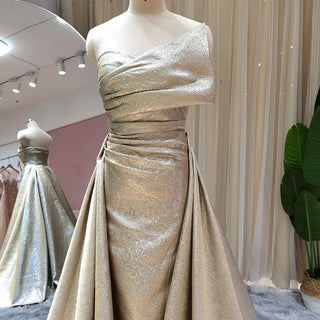 Golden Mirage: Dubai-Inspired Gold Mermaid Evening Gown with Elegant Overskirt - The Ultimate Choice for Black Girls' Weddings, Proms, and Grand Soirees.