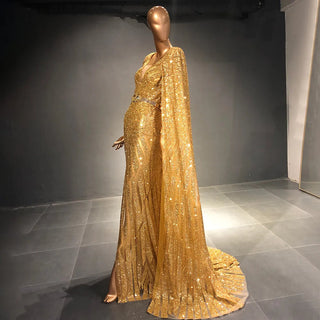 Golden Oasis: Dubai-Inspired Evening Gown Adorned with Sparkly Beads and Elegant Cape - A Dazzling Choice for Weddings and Grand Soirees.