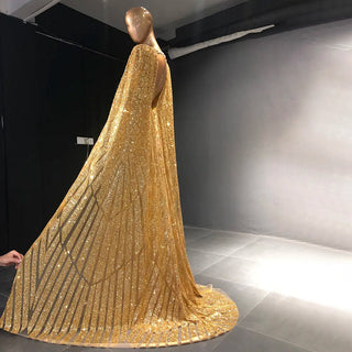 Golden Oasis: Dubai-Inspired Evening Gown Adorned with Sparkly Beads and Elegant Cape - A Dazzling Choice for Weddings and Grand Soirees.