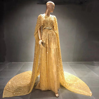 Golden Radiance: Dubai-Inspired Beaded Evening Gown with Cape Sleeves - Perfect for Weddings, Engagements, and Formal Soirees.