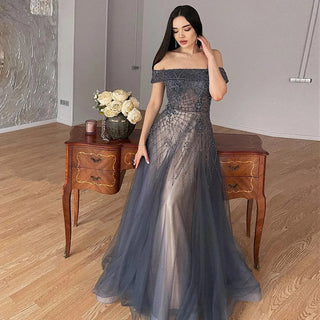 Navy Allure: Arabic Off-Shoulder Evening Gown for Elegant Engagements and Wedding Parties.