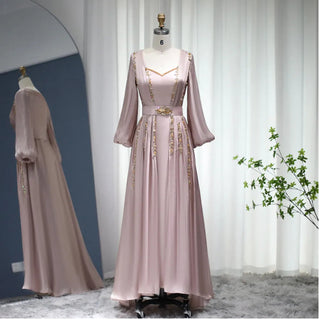 Moroccan Majesty: Rose Gold Kaftan Evening Dress with Long Sleeves - Dubai-Inspired Elegance for Muslim Weddings, Engagements, and Formal Affairs.