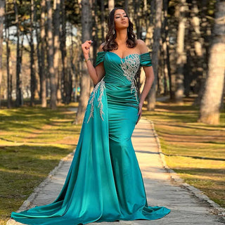 Turquoise Temptation: Elegant Off-Shoulder Mermaid Evening Dress with Overskirt, Perfect for Women at Wedding Parties in Fuchsia and Formal Events.