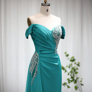 Turquoise Temptation: Elegant Off-Shoulder Mermaid Evening Dress with Overskirt, Perfect for Women at Wedding Parties in Fuchsia and Formal Events.