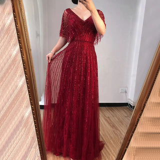 Desert Ruby: Red A-Line Evening Dress with Half Sleeves and Crystal Beading – Dubai 2024 Formal Collection