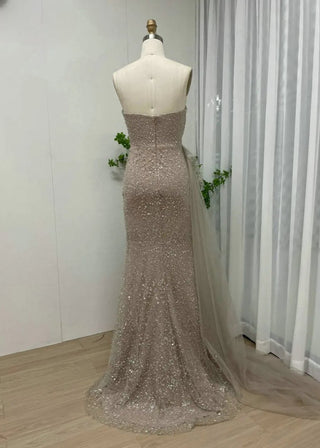 Sexy Champagne Strapless Pleated Evening Dress - Sparkling Sequined Mermaid Gown with Side Train for Wedding Guests