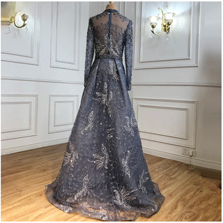 Dubai Azure Twilight: Luxury Blue Muslim Evening Dress with Overskirt and Long Sleeves, Exhibiting Elegant Arabic-inspired Design, Ideal for Weddings and Formal Occasions.