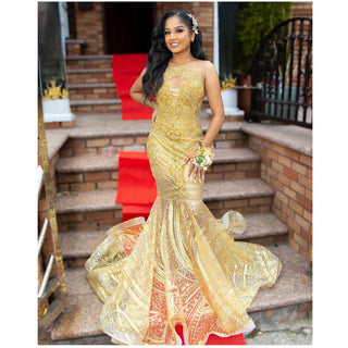 Luxurious Gold Mermaid Gown with Sheer Illusion and Intricate Embellishments