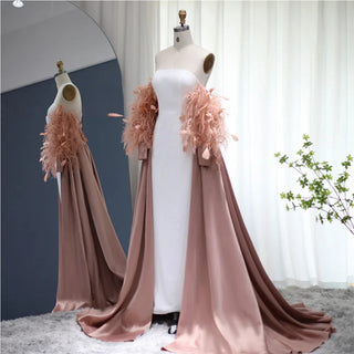 Dubai Petal Elegance: Rose Pink Feathered Gown with Cape for Women's Formal Wedding Festivities.