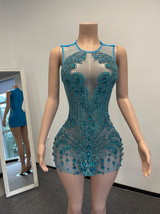 Elegant Beaded Mini Dress with Sheer Panels and Intricate Detailing