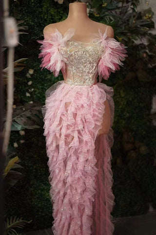 Enchanting Pink Ruffled Gown with Embellished Bodice and Feather Accents