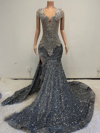 Opulent Crystal Embellished Gown with Dramatic High Slit and Feather Accents