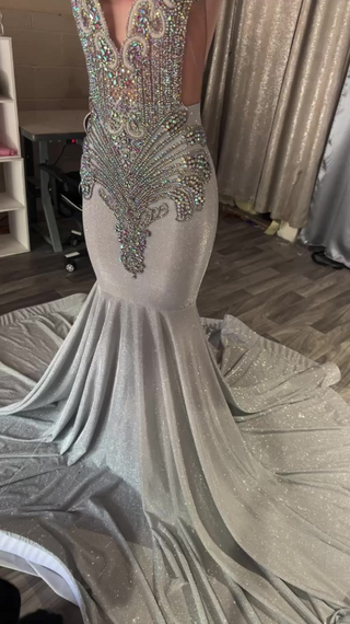 Glamorous Silver Sequin Mermaid Gown with Intricate Beading and Sheer Detailing