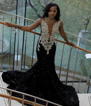 Elegant Black Sequin Gown with Feathered Embellishments and Deep Plunge