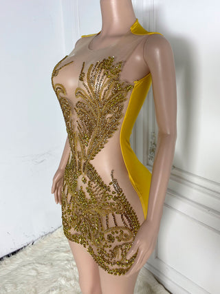 Sheer Illusion Mini Dress with Intricate Beadwork and High Neckline