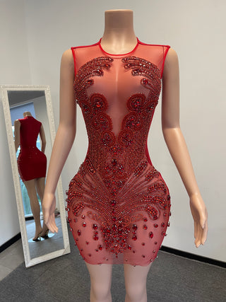 Elegant Beaded Mini Dress with Sheer Panels and Intricate Detailing