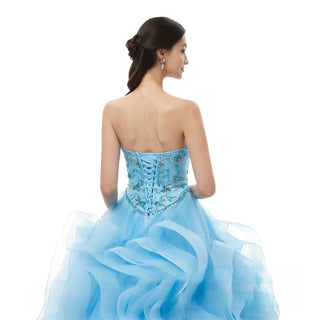 Enchanting Strapless Ball Gown with Beaded Bodice and Voluminous Ruffle Skirt