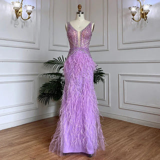 Dubai Pink Plume: Luxury Pink Feathered Evening Dress with Gold Accents and a V-Neck, Perfect for Women at Weddings and Formal Parties.